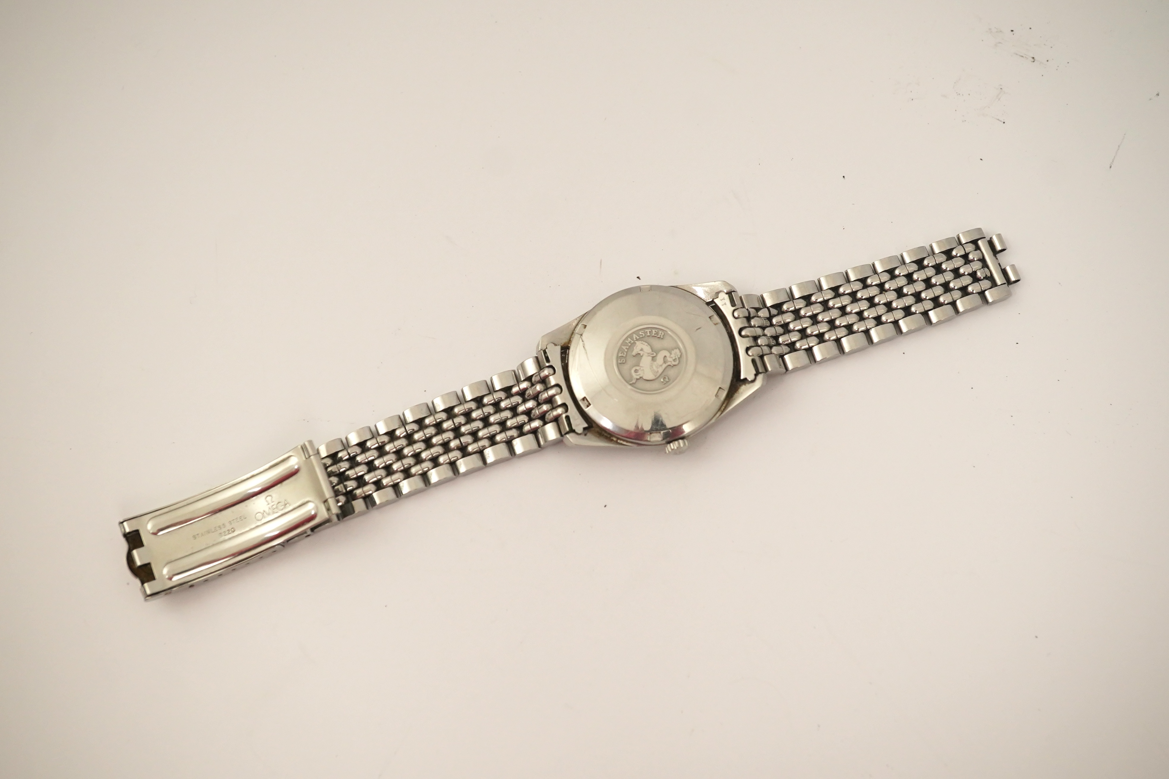 A gentleman's 1960's? stainless steel Omega Seamaster automatic wrist watch, on a stainless steel Omega bracelet